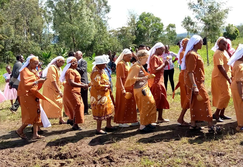Sr. Joyce Meyer, in the center without a headpiece, joins sisters in Lusaka, Zambia, during a 2024 convening of sisters by the Conrad Hilton Foundation. (Courtesy of Joyce Meyer)