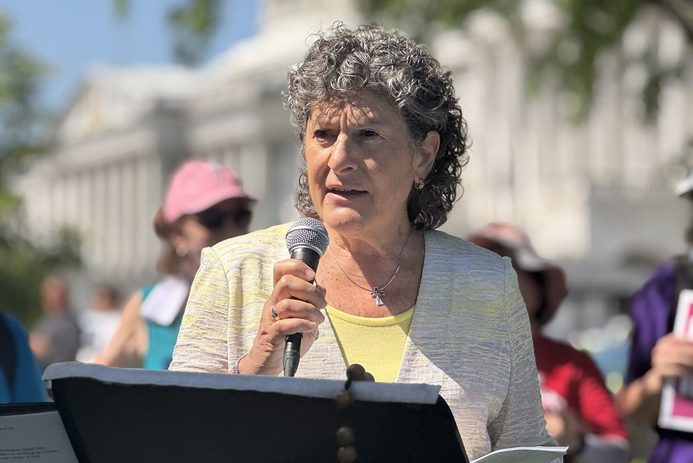 Mercy Sr. Mary Haddad, president and CEO of the Catholic Health Association of the United States, talks about adverse effects for the poor June 24, 2025, at the U.S. Capitol in Washington. Haddad joined a group of some 200 sisters and supporters speaking out against the Big Beautiful Bill, passed by Congress in early July, one that sisters fear will gut social safety net programs for the poor to extend tax breaks for the rich. (GSR photo/Rhina Guidos)
