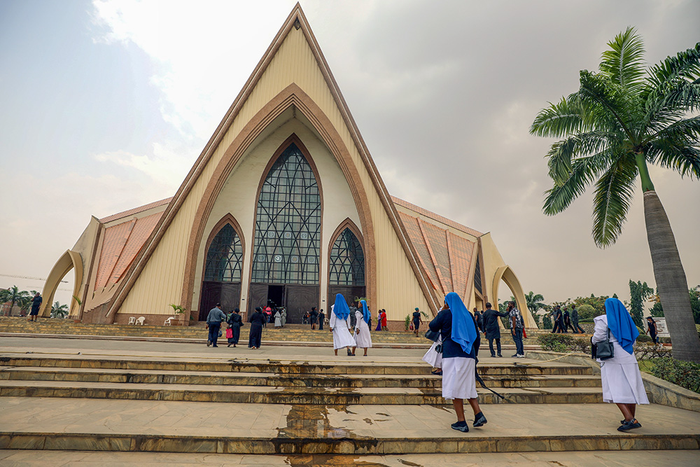 Women religious are pictured in a file photo entering a church in Abuja, Nigeria. (OSV News/Reuters/Afolabi Sotunde)