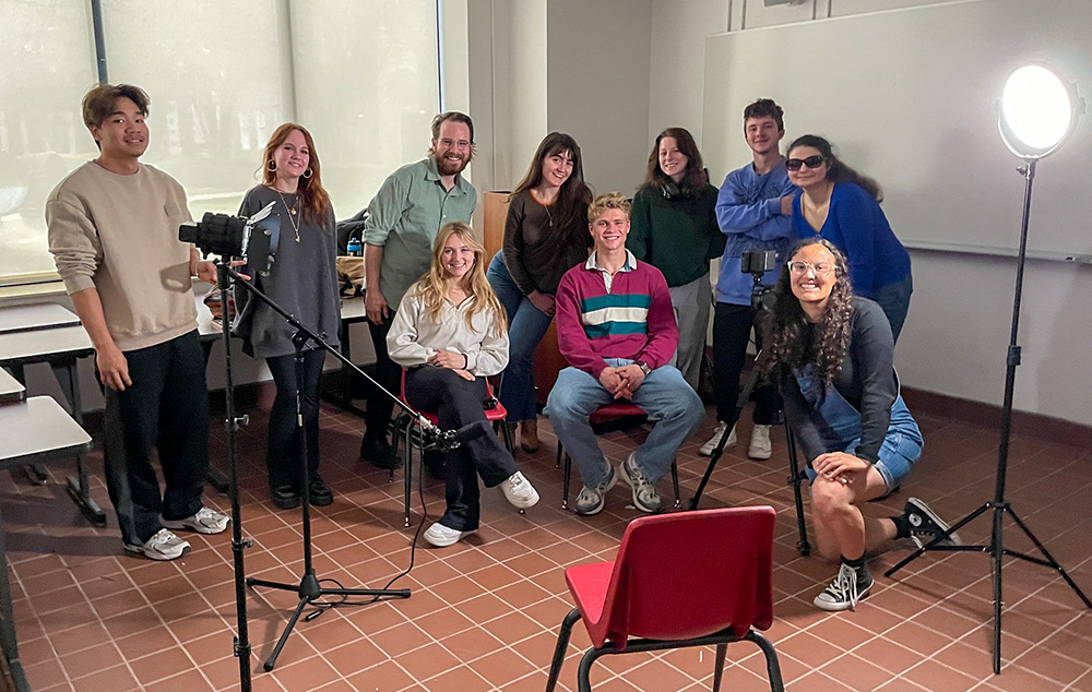 A group photo of the class: standing from left, Duy Do, Charlotte Berg, David Israel, Carmen Hershey, Mary Lynch, Oliver Ball, Alexis Gautreau; and sitting/kneeling from left, Ava Radosevich, Harvey Quiddington, Leila Jones (Justin Nystrom)