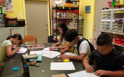 Children create art at Inner City Development in San Antonio. (Courtesy of Martha A. Kirk) 