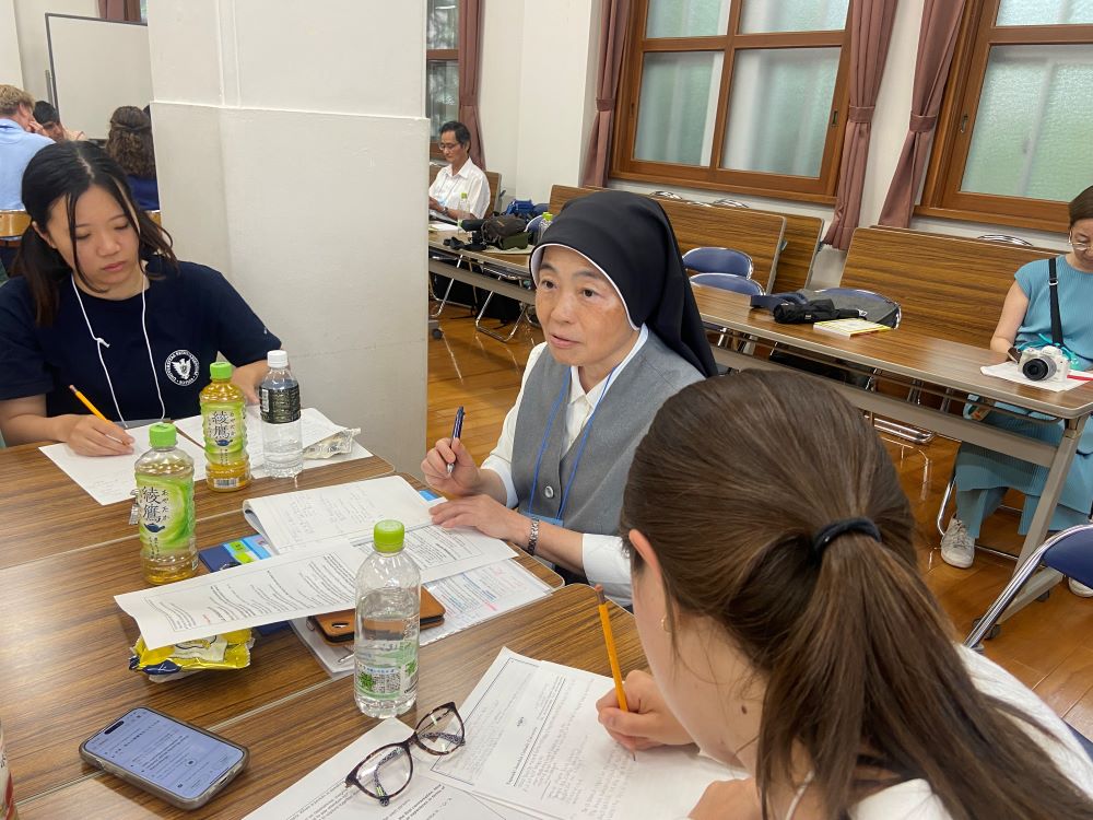 Sr. Kumiko Sakamoto facilitates a small group session.