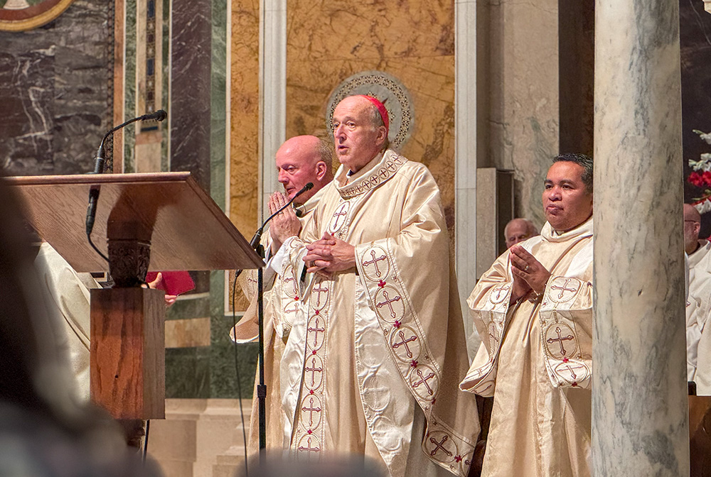 Cardinal Robert McElroy celebrates Mass Sept. 28, 2025, at the Cathedral of St. Matthew the Apostle in Washington during a Mass for World Day of Migrants and Refugees, which the church observes Oct. 4-5 this year. In his homily, McElroy, archbishop of Washington, singled out what he called the government's assaults against migrants and thanked church members and others who have come to their aid. (GSR photo/Rhina Guidos)