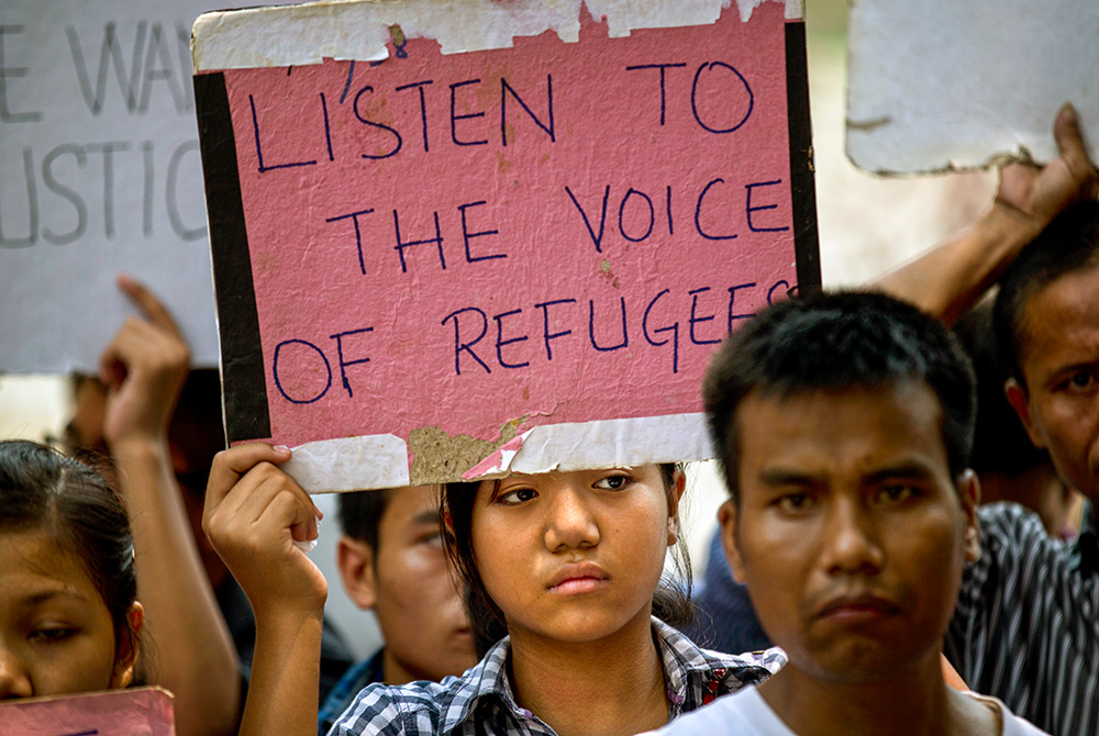Members of the Chin ethnic minority group from Myanmar rally outside the New Delhi office of the United Nations High Commissioner for Refugees on June 19, 2015, a day ahead of World Refugee Day. (AP/Saurabh Das)
