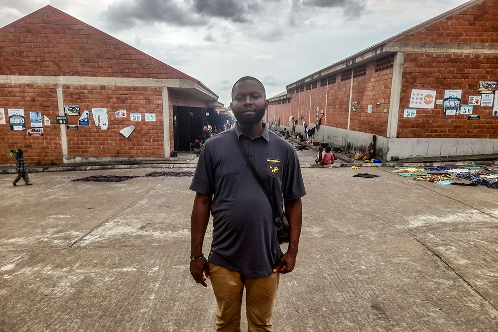 Azaaior Sunday at the International Market Camp in Makurdi, Benue State. He told Global Sisters Report that the church has tried to comfort him. "They hold church services on Sundays and during the week, taking people's minds away from the troubles." (John Chukwu)