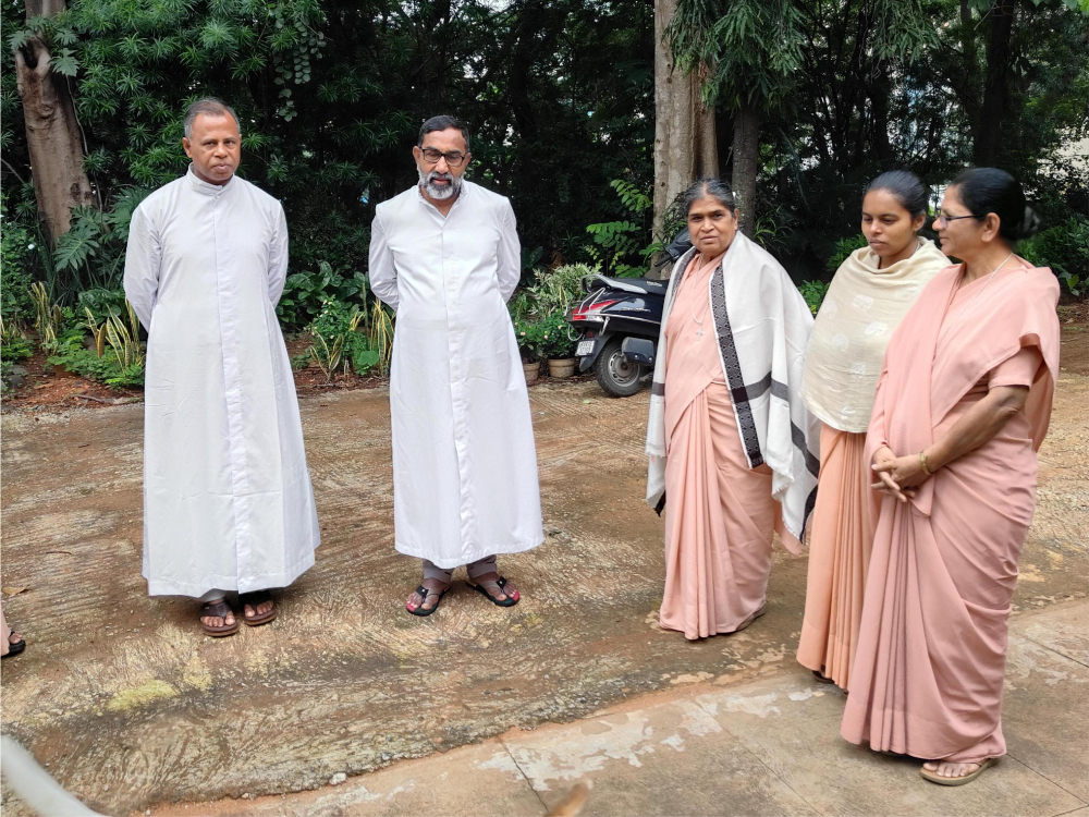 Priests and nuns interact after the morning Mass at Franciscan Sisters of the Immaculate Convent in the campus of Sumanahalli at Bengaluru, capital of Karnataka state in southwestern India. (Thomas Scaria)