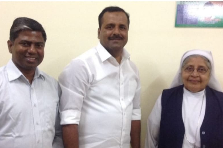 St. Joseph's of Tarbes Sr. Mary Mascarenhas with U.T. Khader (center), health minister of Karnataka state in 2015. He worked with the nuns to employ over 100 leprosy-cured persons in government service. (Courtesy of Sr. Mary Mascarenhas)