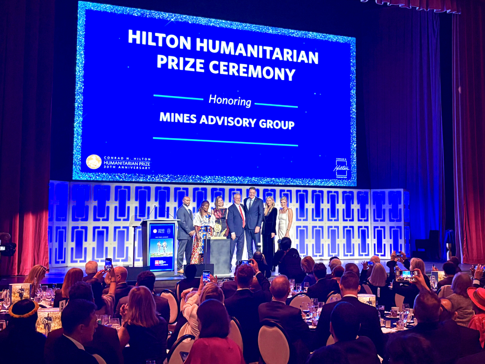The Mines Advisory Group representatives receive the 2025 Hilton Humanitarian Prize in New York, Oct. 6. (NCR photo/Camillo Barone)