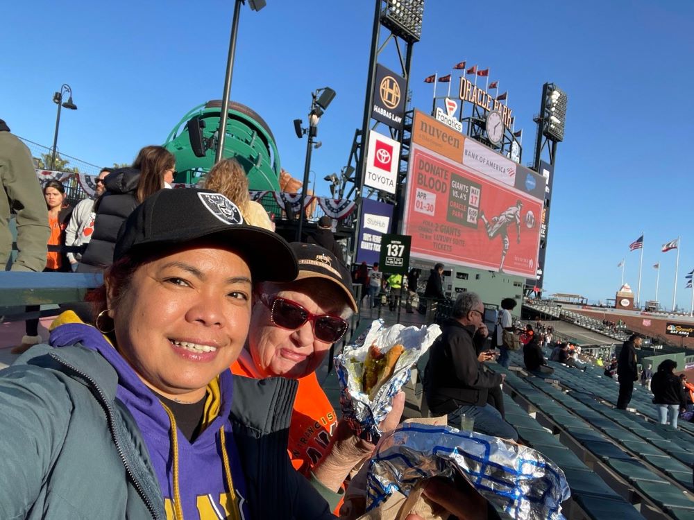 Sr. Nodelyn Abayan, left, and Sr. Celeste Arbuckle attend a San Francisco Giants game April 8. (Nodelyn Abayan)