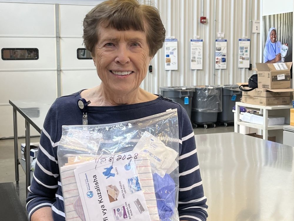 Sr. Ritamary Brown holds a clean birth kit at Hospital Sisters Mission Outreach. (Courtesy of Ritamary Brown) 