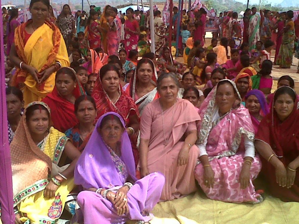 Sr. Rosily Kolencherry poses with a group of women.