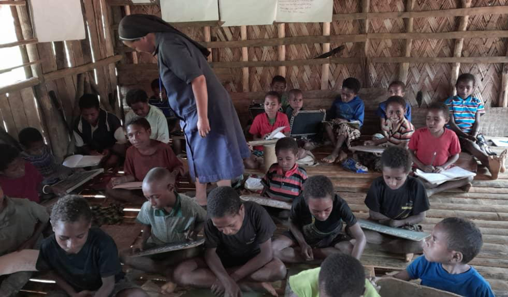 The Cluny sisters offer literacy and education programs for local children in Papua New Guinea. Education was unavailable when the sisters first arrived, so they started a school. Once the students were ready, they were trained as teachers, and they now teach in the 12 schools. (Courtesy of Sylvian Aua)