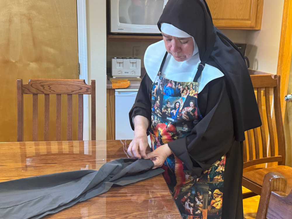 Capuchin Poor Clare Sr. Maria Elena Romero sews Oct. 4, 2025 at the Veronica Giuliani Monastery in Wilmington, Delaware.