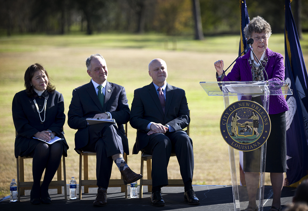 St. Joseph Sr. Pat Bergen speaks at the January 2016 news conference announcing the plans to convert the congregation's former provincial house in New Orleans into a water garden. Listening are then-Louisiana Gov. John Bel Edwards, second from left, and then-mayor Mitch Landrieu, third from left. (Courtesy of the Congregation of Sisters of St. Joseph)