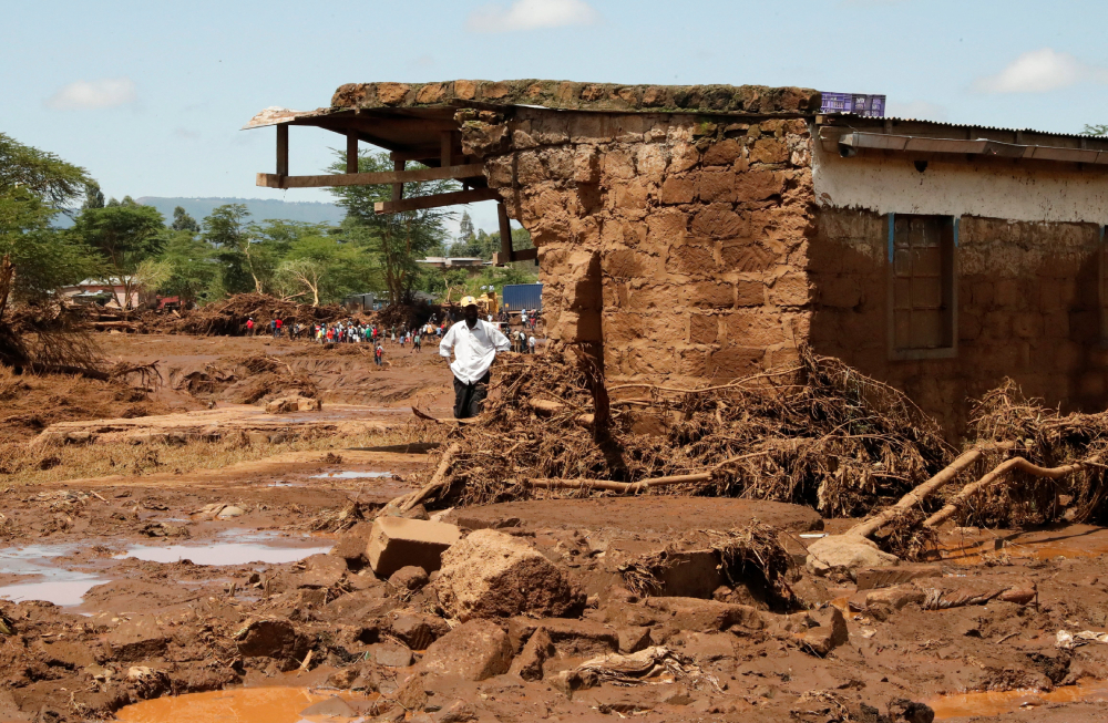 A man looks at the ruins of a house in the Kamuchiri village of Mai Mahiu in central Kenya's Nakuru County April 29, 2024, after heavy flash floods wiped out several homes when a dam burst, following heavy rains. (OSV News/Reuters/Thomas Mukoya)