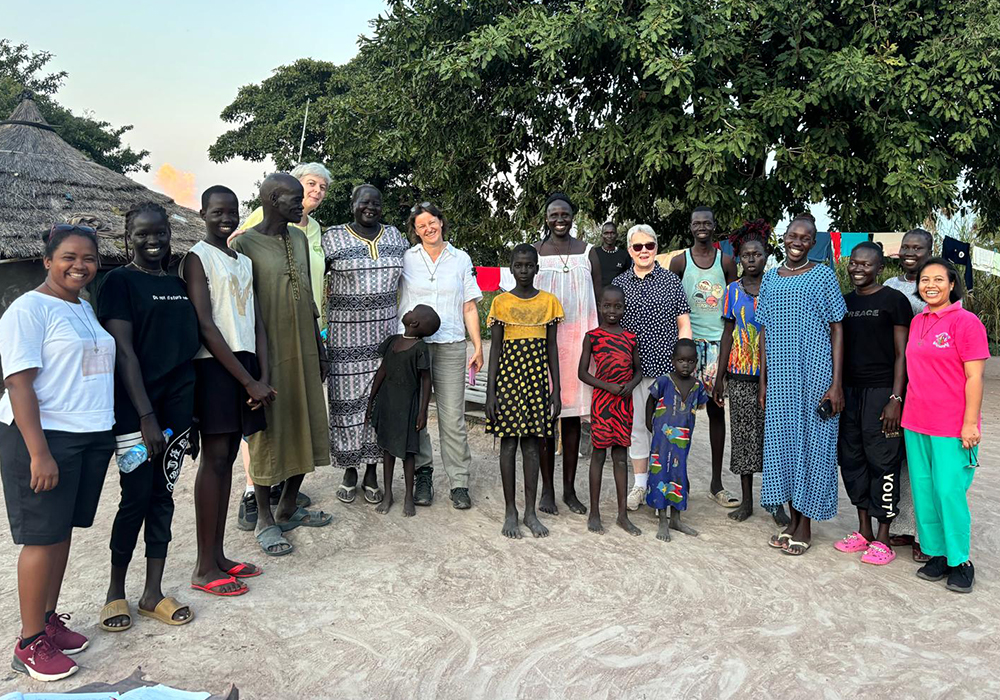 Sisters of Institute of the Blessed Virgin Mary and Congregation of Jesus meet local families at Loreto Rumbek, in South Sudan. (Courtesy of Noelle Corscadden)