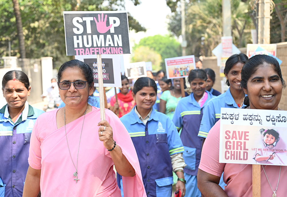 Sr. Sherly Thomas, far right, joined vulnerable community members in a public rally advocating for the protection of women and girls on Women's Day, March 8, 2025, in Bangalore, India. Participants called for justice and stronger action against exploitation and gender-based violence. (Courtesy of Sr. Sherly Thomas)