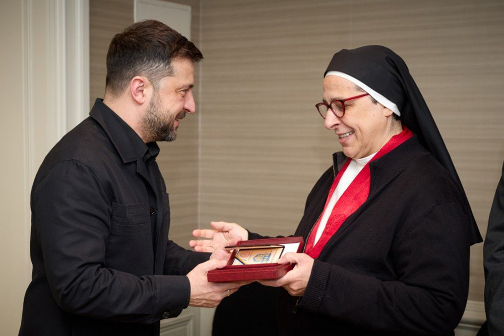 Ukrainian President Volodymyr Zelenskyy awards Argentine Dominican Sr. María Lucía Caram Padilla the Order of Princess Olga, III class, in Madrid Nov. 18, 2025. Caram was honored for her efforts to provide humanitarian aid and support since the beginning of the Russian invasion of Ukraine. (OSV News/Courtesy of Office of the President of Ukraine)