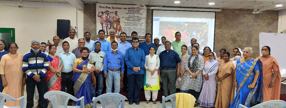 Sacred Hearts Sr. Sujata Jena, center, wearing white salwar, with the participants at a seminar on migrants Feb. 26, organized by the Commission for Migrants of the Archdiocese of Calcutta, India. (Courtesy of Sujata Jena)