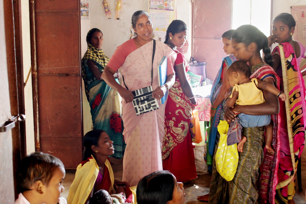 Sister Lisha, a nurse, makes regular visits to a nearby health center to give guidance to young mothers. (Tessy Jacob)