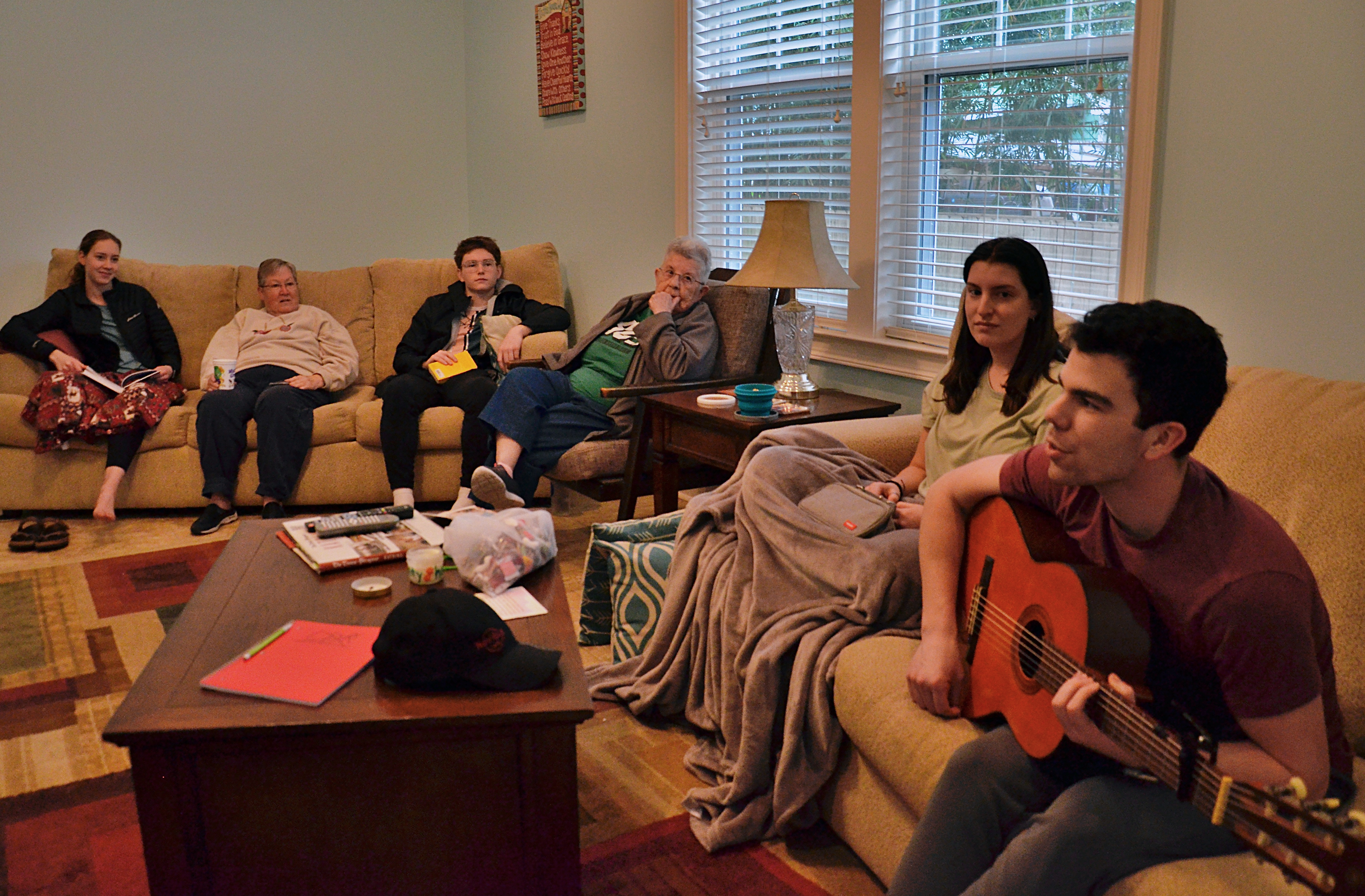 Students from Creighton University relax at the House of Charity in New Orleans after a long day of volunteering and learning about the city and its inhabitants. (GSR photo/Dan Stockman)