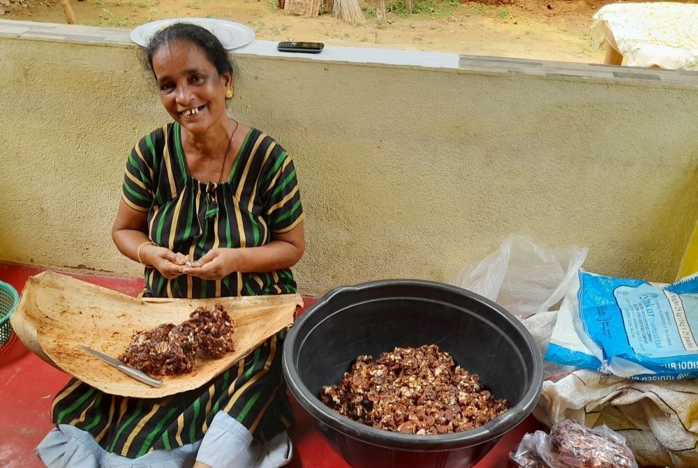 Lucy D'Souza prepares pickled tamarind to sell in the market in Mangaluru, southern India. (Courtesy of Clara D'Cunha)