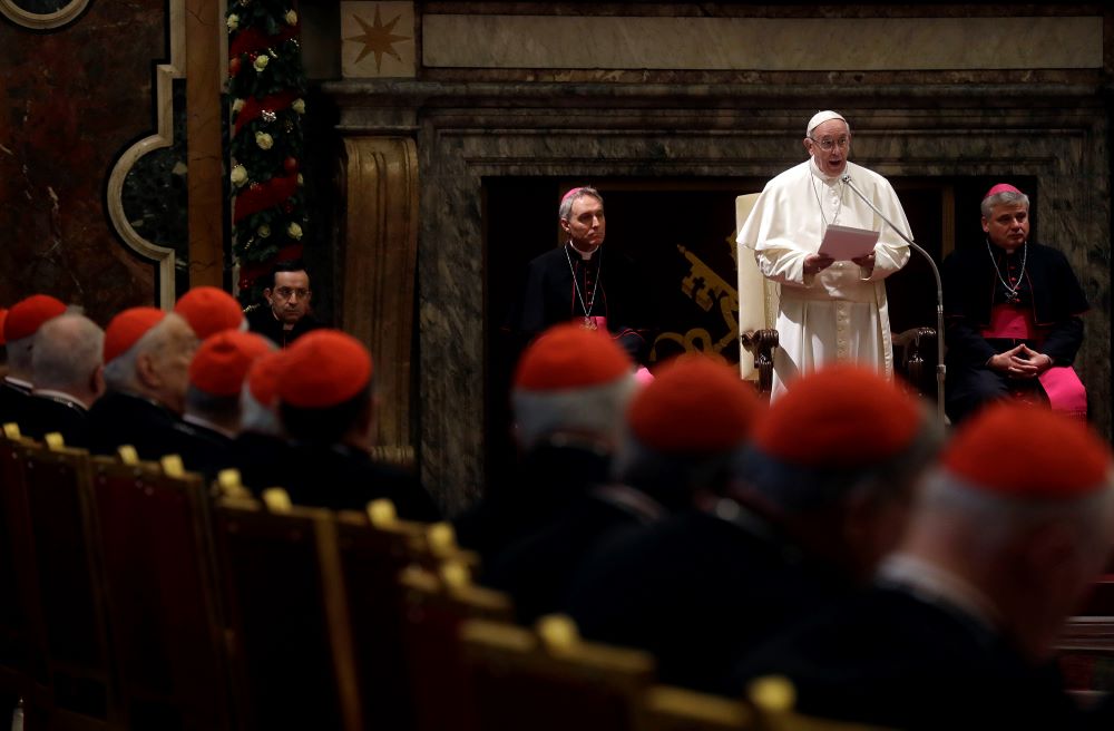 Pope Francis speaks during the traditional greetings to the Roman Curia in the Sala Clementina (Clementine Hall) of the Apostolic Palace at the Vatican on Dec. 22, 2016. (AP/Gregorio Borgia, Pool)