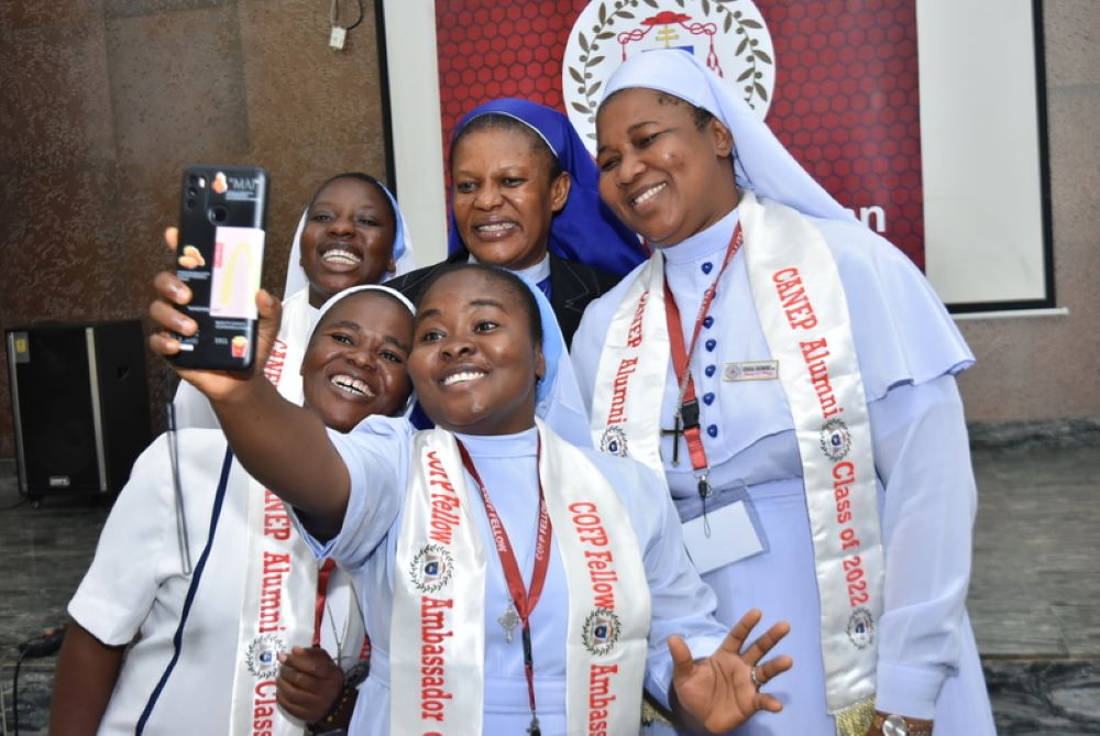 Sr. Agatha Chikelue, top row center, poses with participants in the Fellowship Program of the Cardinal Onaiyekan Foundation for Peace at their June graduation in Abuja, Nigeria. (Courtesy of Stephen Udama)