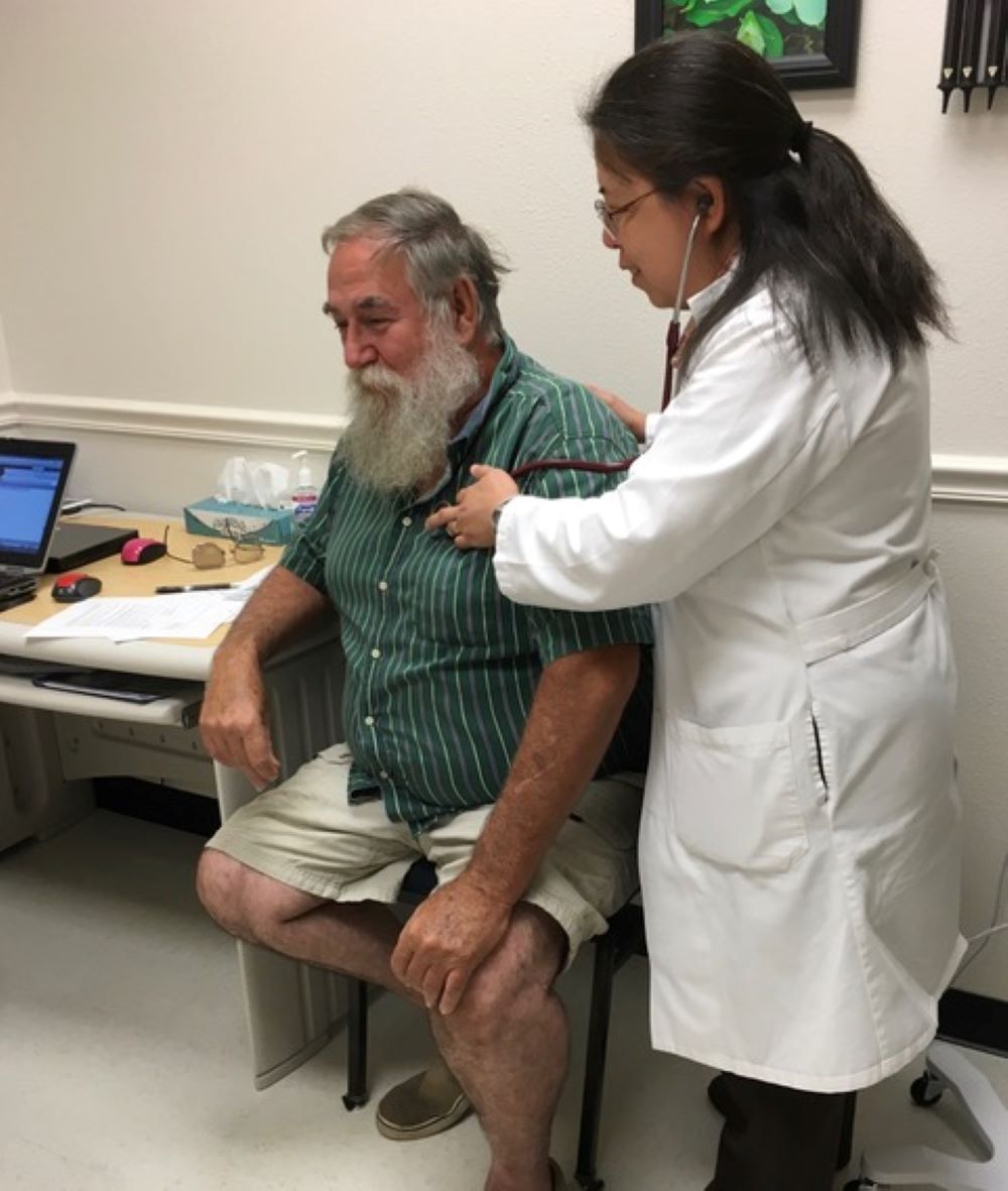 Sr. Ricca Dimalibot, a physician and member of the Sisters of Charity of the Incarnate Word, attends to patients in Houston susceptible to health conditions caused or exacerbated by extreme heat. (Courtesy of Ricca Dimalibot)