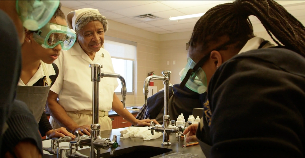 Holy Family Sr. Judith Therese Barial with students at St. Mary's Academy in New Orleans. Barial and her work stand to benefit from a new grant from the Conrad N. Hilton Foundation to the Loyola Institute for Ministry. (Courtesy of Loyola University)