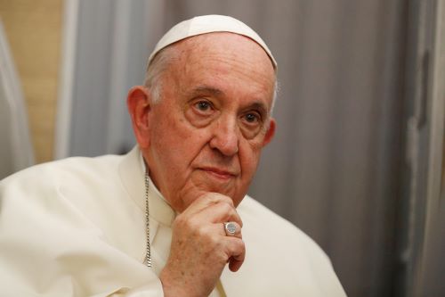 Pope Francis answers questions from journalists aboard his flight from Iqaluit, in the Canadian territory of Nunavut, to Rome July 29.