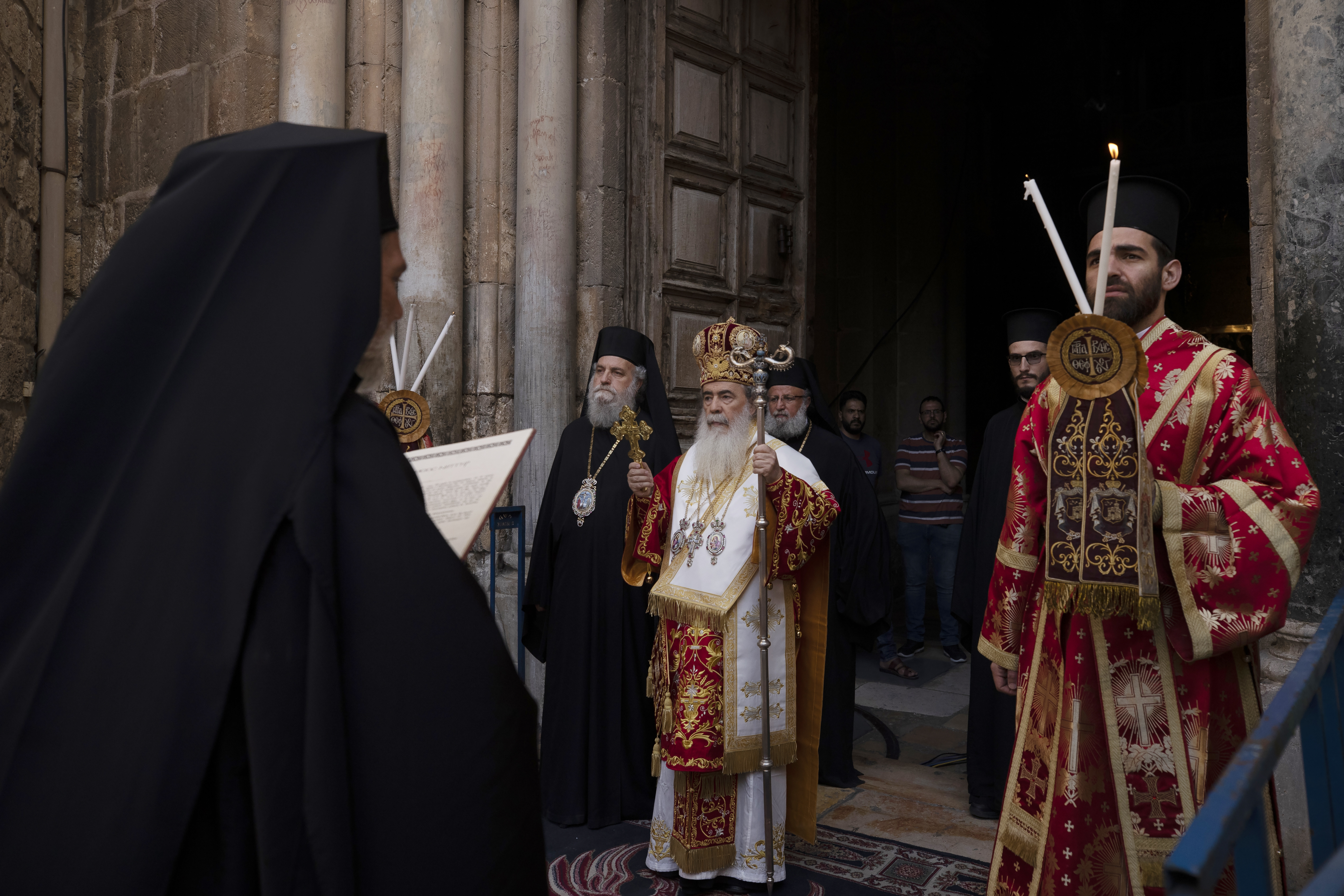 Greek Orthodox Patriarch of Jerusalem Theophilos III, center, walks in procession for the Washing of the Feet ceremony during the orthodox Holy Week at the Church of Holy Sepulchre, Thursday, April 29, 2021. (AP Photo/Maya Alleruzzo) Greek Orthodox Patriarch of Jerusalem Theophilos III, center, walks in procession for the Washing of the Feet ceremony during the orthodox Holy Week at the Church of Holy Sepulchre, Thursday, April 29, 2021. (AP Photo/Maya Alleruzzo)
