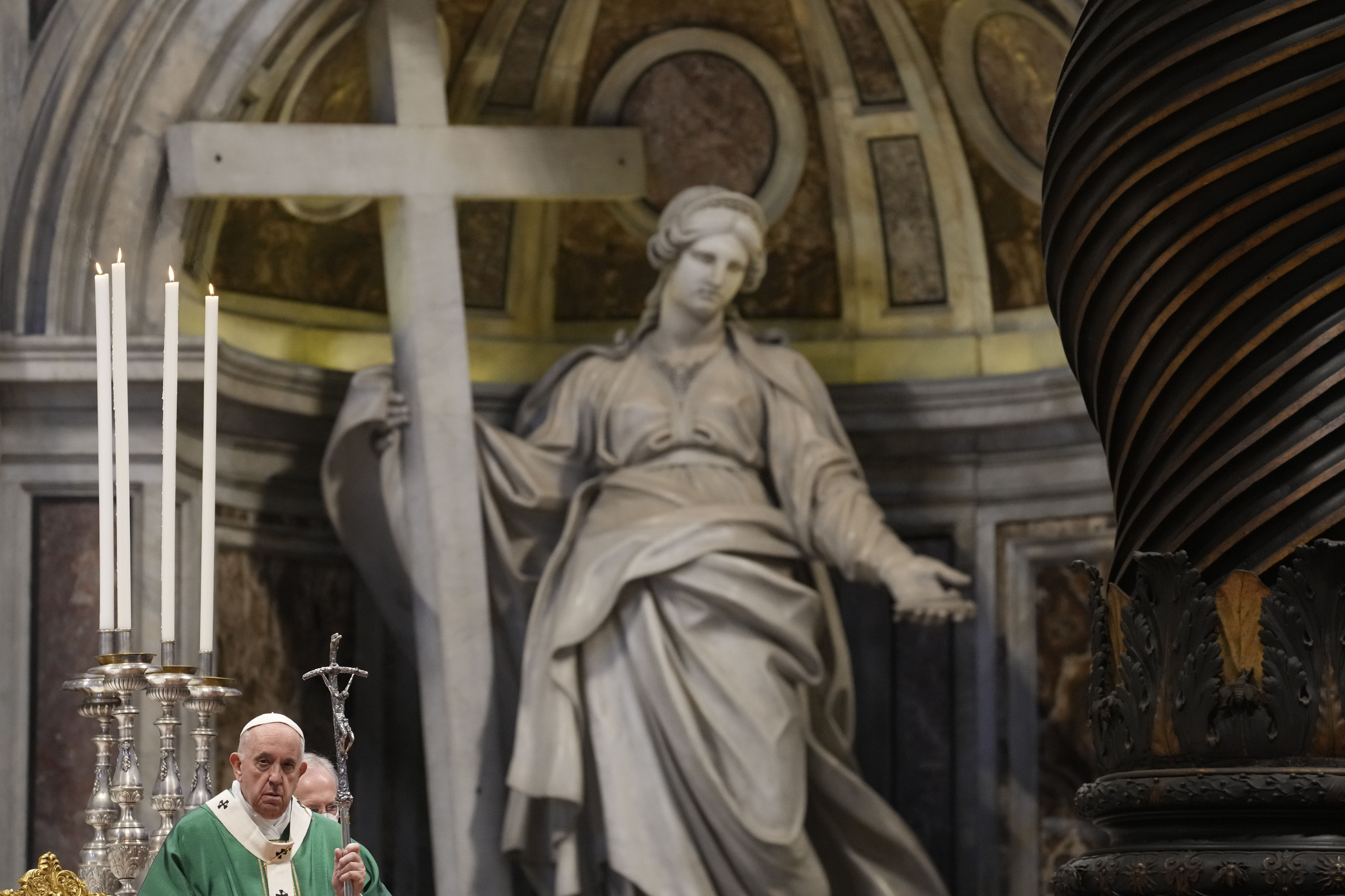 In this Oct. 10, 2021 file photo, Pope Francis holds the pastoral staff as he celebrates a mass in St. Peter's Basilica for the opening of the bishops' synod, at the Vatican. A European court ruled Tuesday, Oct. 12, 2021, that the Vatican couldn't be sued In this Oct. 10, 2021 file photo, Pope Francis holds the pastoral staff as he celebrates a mass in St. Peter's Basilica for the opening of the bishops' synod, at the Vatican. A European court ruled Tuesday, Oct. 12, 2021, that the Vatican couldn't be sued