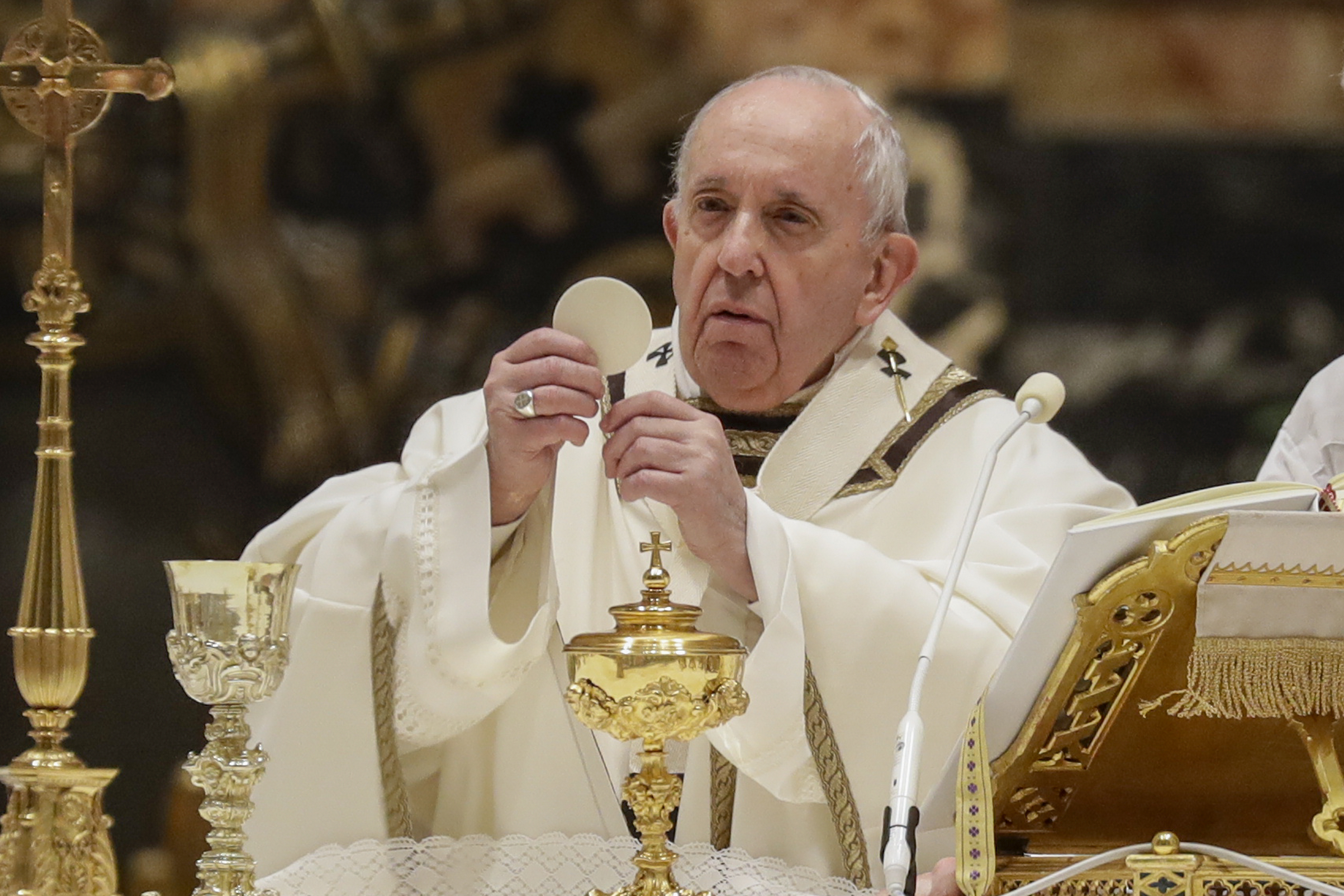 In this Feb. 2, 2021 file photo, Pope Francis celebrates a Mass with members of religious institutions in St. Peter's Basilica at the Vatican. (AP Photo/Andrew Medichini, pool)