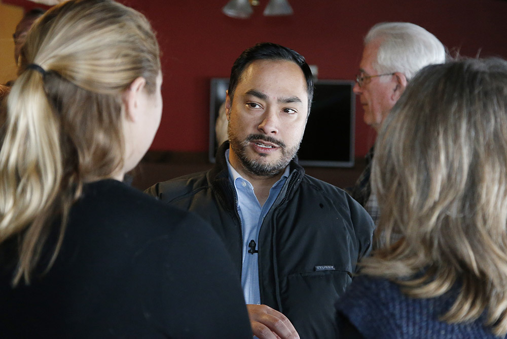 Rep. Joaquin Castro, R-Texas, talks with attendees at an Elizabeth Warren event Jan. 22, 2020, as he campaigns for then-Democratic presidential candidate Sen. Elizabeth Warren, D-Mass, in Denison, Iowa. (AP/Sue Ogrocki)