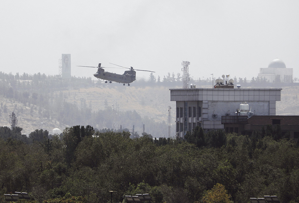 U.S. personnel were evacuated from the U.S. embassy in Kabul, the Afghan capital, as Taliban insurgents broke through the city's defensive line Aug. 15. (AP/Rahmat Gul)