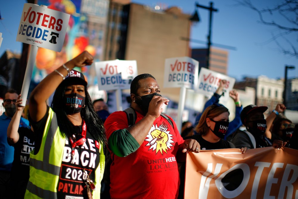 People in Philadelphia march Nov. 7, as they celebrate the announcement that Democrat Joe Biden had won the presidential election. (CNS/Reuters/Eduardo Munoz)