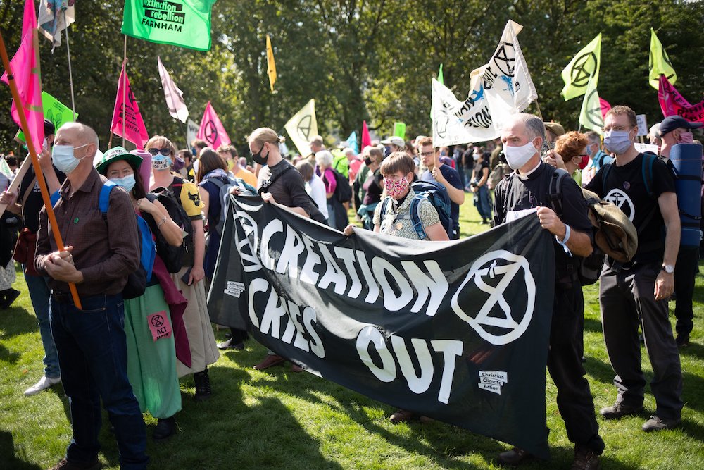 Members of Christian Climate Action take part in a climate change protest in London Sept. 2. (CNS/Courtesy of WCC/Sean Hawkey)