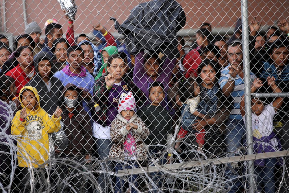 Central American migrants are seen inside an enclosure in El Paso, Texas, March 27, 2019. (CNS/Reuters/Jose Luis Gonzalez)