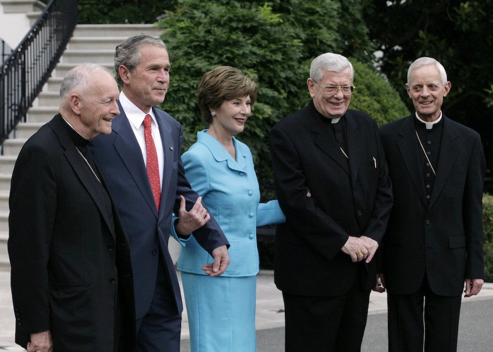 Posing for photographers on the South Lawn of the White House in Washington July 18, 2006, are former-Cardinal Theodore McCarrick, then-retired archbishop of Washington; U.S. President George W. Bush; first lady Laura Bush; Archbishop Pietro Sambi, aposto Posing for photographers on the South Lawn of the White House in Washington July 18, 2006, are former-Cardinal Theodore McCarrick, then-retired archbishop of Washington; U.S. President George W. Bush; first lady Laura Bush; Archbishop Pietro Sambi, aposto
