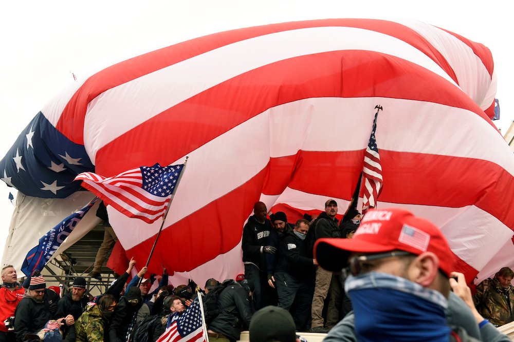 Supporters of President Donald Trump gather in front of the U.S. Capitol in Washington Jan. 6, 2021. (CNS/Reuters/Stephanie Keith)