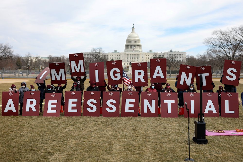 Immigration advocates display a message on the National Mall near the U.S. Capitol in Washington Feb. 17, 2021. (CNS/Reuters/Tom Brenner) Immigration advocates display a message on the National Mall near the U.S. Capitol in Washington Feb. 17, 2021. (CNS/Reuters/Tom Brenner)