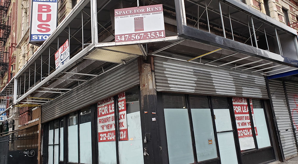 A vacant business storefront in New York City's Chinatown, located several blocks west of Cabrini Immigrant Services, illustrates the pandemic-related economic downturn affecting New York City. (GSR photo/Chris Herlinger)