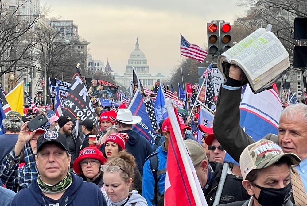 People march in Washington, D.C., in support of President Donald Trump, Dec. 12, waving flags and Bibles. The second such march following the election, it included a religious element, the Jericho March's "Let the Church Roar Prayer Rally" on the National People march in Washington, D.C., in support of President Donald Trump, Dec. 12, waving flags and Bibles. The second such march following the election, it included a religious element, the Jericho March's "Let the Church Roar Prayer Rally" on the National