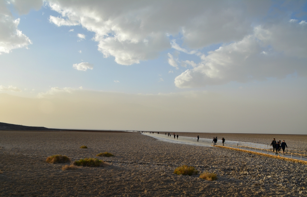 The wind starts to pick up at Badwater Basin as students conclude their last day of A Desert Experience Retreat in Death Valley. (Luis Melgar)