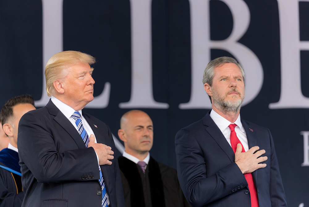 Then-President Donald Trump attends the Liberty University commencement ceremony, with Jerry Falwell Jr., May 13, 2017, in Lynchburg, Virginia. Trump gave a commencement speech to the graduating class. (Wikimedia Commons/White House photo/Shealah Craighea Then-President Donald Trump attends the Liberty University commencement ceremony, with Jerry Falwell Jr., May 13, 2017, in Lynchburg, Virginia. Trump gave a commencement speech to the graduating class. (Wikimedia Commons/White House photo/Shealah Craighea