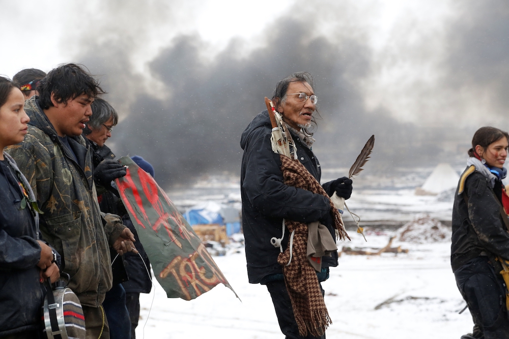 Native American protesters march against the Dakota Access oil pipeline near Cannon Ball, North Dakota, in January 2019. Appointment of a Native American interior secretary could change the government's relationship with the country's original peoples. (C