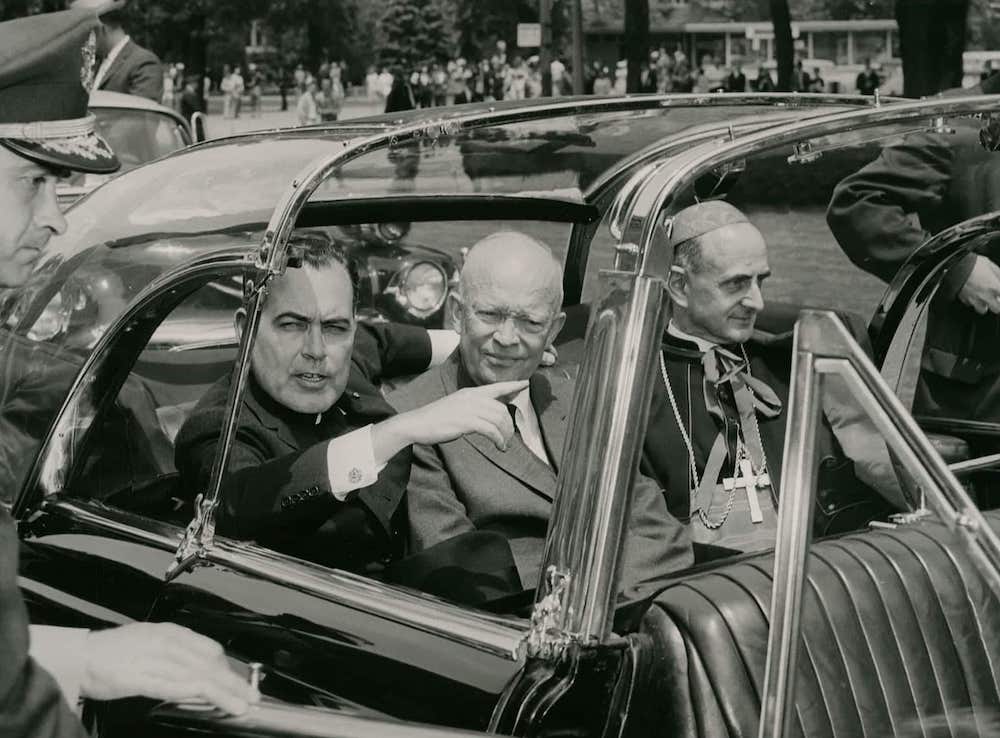 President Dwight D. Eisenhower, center, rides with Cardinal Giovanni Montini, right, a fellow honoree during the University of Notre Dame's 1960 commencement. Montini became Pope Paul VI in 1963. (Courtesy of University of Notre Dame Archives) President Dwight D. Eisenhower, center, rides with Cardinal Giovanni Montini, right, a fellow honoree during the University of Notre Dame's 1960 commencement. Montini became Pope Paul VI in 1963. (Courtesy of University of Notre Dame Archives)