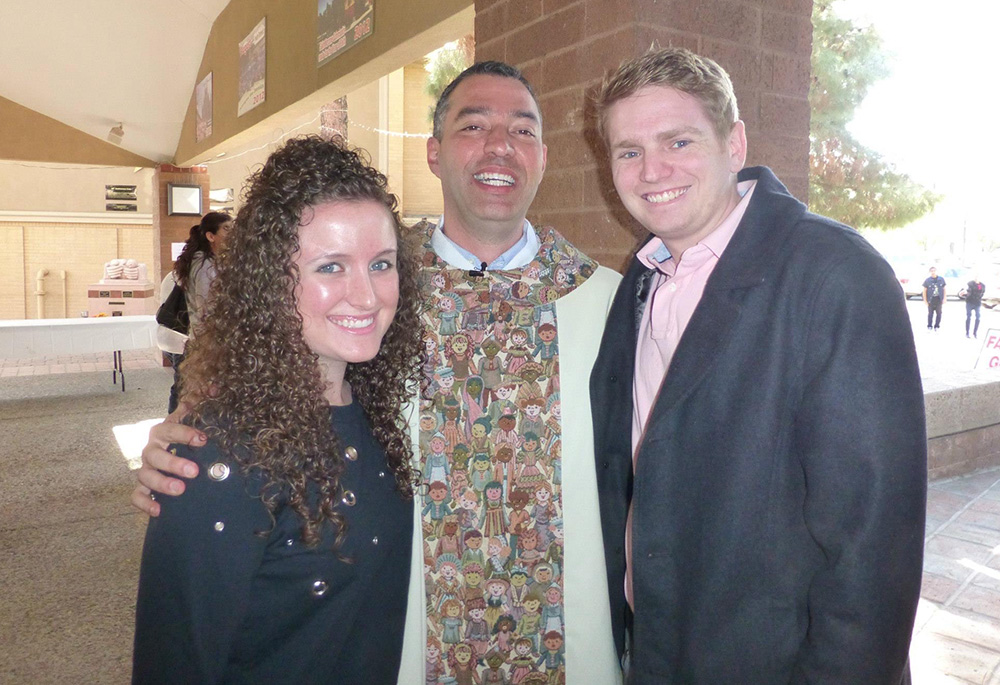 Kimberly Roland standing with Fr. Andrés Arango and her now husband Brendan Brady outside St. Jerome Parish in Phoenix, from around 2012-13 (Courtesy of Kimberly Roland)