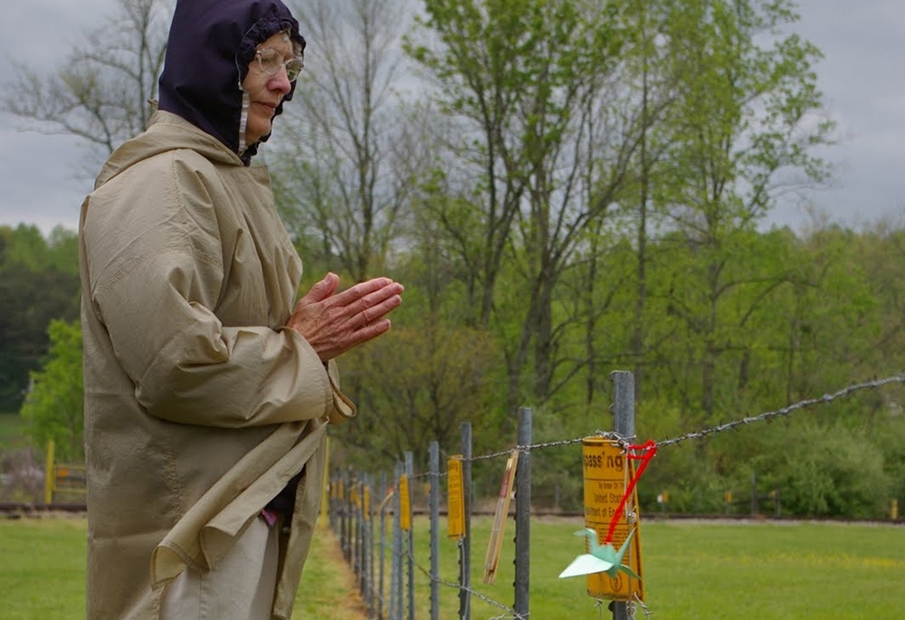 Presentation Sr. Mary Dennis Lenstch prays during a peace witness outside the Y-12 Nuclear Weapons Complex near Oak Ridge, Tennessee, in April 2011. (NCR photo/Joshua J. McElwee)